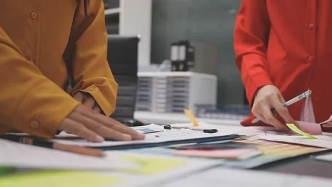 Group of young application developers analyzing uxui mobile app templates d.. Stock Footage 320526806