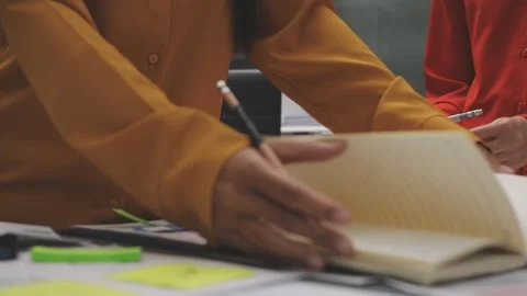 Group of young application developers analyzing uxui mobile app templates d.. Stock Footage 320526983