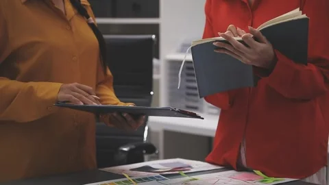 Group of young application developers analyzing uxui mobile app templates d.. Stock Footage 320527025