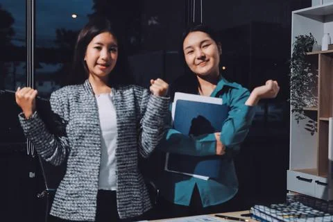 Group of young application developers analyzing uxui mobile app templates d.. Stock Photos