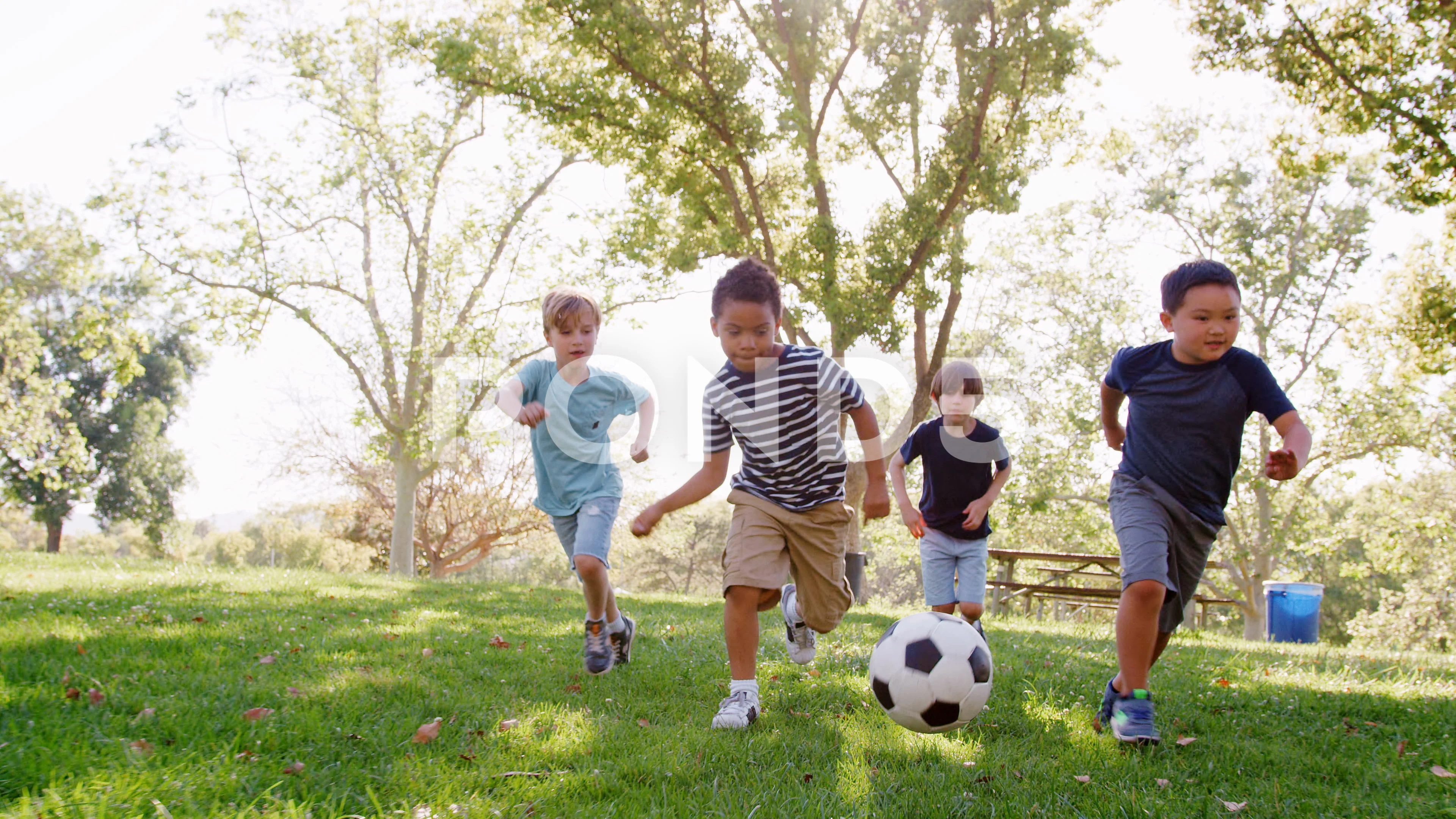 friends playing soccer