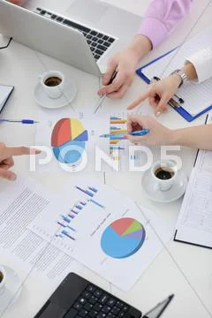 Group of young business people at meeting Stock Photos