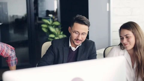 Group of young business people working together in creative office Stock Footage 80325862