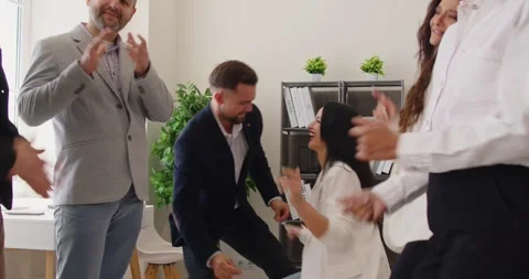 Group of young company employees dancing in modern office Stock Footage 341806384