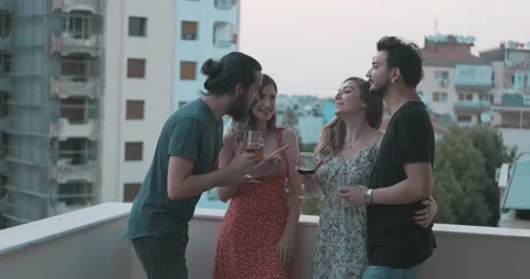 Group of young couple are drinking wine, cheers in dinner time. Friendship, t Video stock 156492962