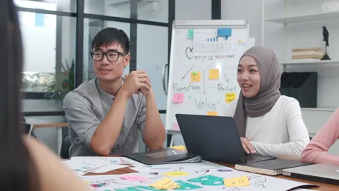 Group of young creative people discussing business brainstorming meeting. Stock Footage 140029948