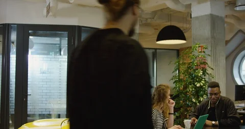 A Group of Young Creative Professionals Meeting in Modern Coworking Office - Stock Footage 129031080