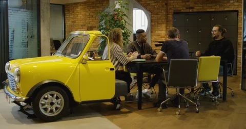 A Group of Young Creative Professionals Meeting in Modern Coworking Office - Stock Footage 129035669