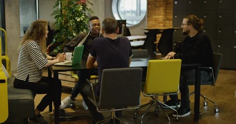 A Group of Young Creative Professionals Meeting in Modern Coworking Office - Stock Footage 129039842
