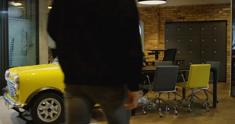 A Group of Young Creative Professionals Meeting in Modern Coworking Office - Stock-Footage 129043904