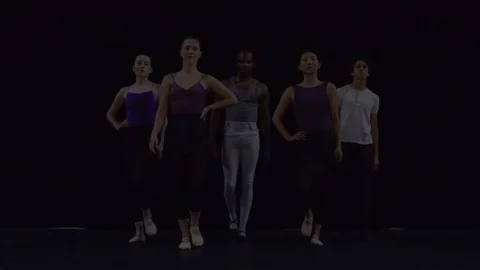 Group of young dancers on stage walking towards camera. Stock-Footage 88035914