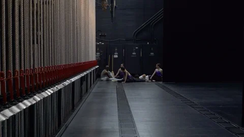 Group of young dancers warming up at side of stage. Stock Footage 88035969