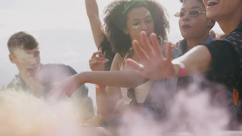 Group Of Young Friends Dancing Behind Barrier At Outdoor Music Festival Video stock 119838433