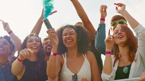 Group Of Young Friends Dancing Behind Barrier At Outdoor Music Festival  Waving 스톡 동영상 312681344