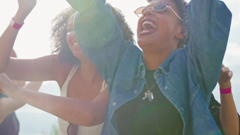 Group Of Young Friends Dancing Behind Barrier At Outdoor Music Festival  With Stock Footage 312683617