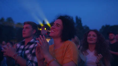 Group of young friends dancing at summer festival. Stock Footage 195958059