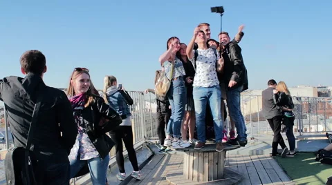 Group Of Young Friends Having Fun And Taking Selfie By Smartphone Video stock 64487627