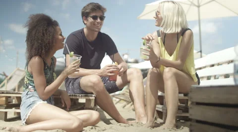 Group of young friends having spending time outdoor. 動画素材 65516935