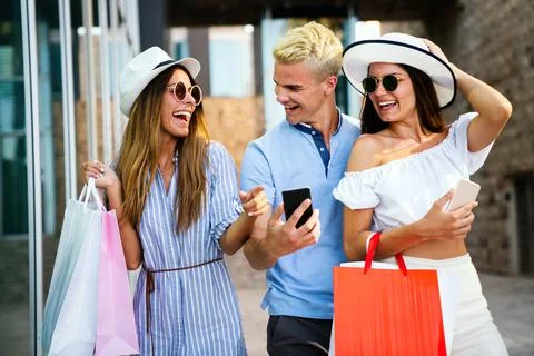 Group of young friends people doing selfie after shopping Stock Photos