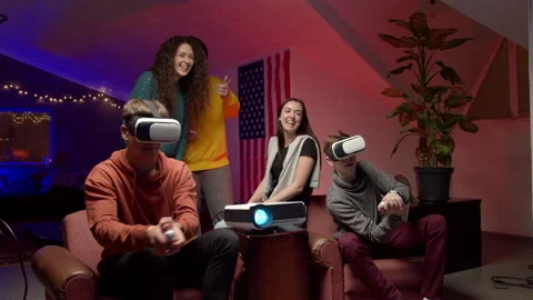 Group of young friends playing virtual videogame Stock Footage 147398671