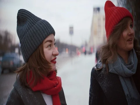 Group Of Young Friends Walking Through Street In Winter City Stock Footage 72486833