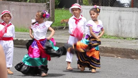 A group of young girls are dancing in the street Stock Footage 272656953