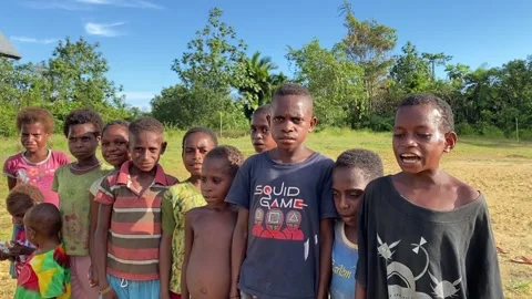 Group of Young Indigenous Children Standing Together in Rural Village Stock Footage 321536740