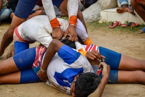 A group of the young man performing Indian folk martial dance 写真素材
