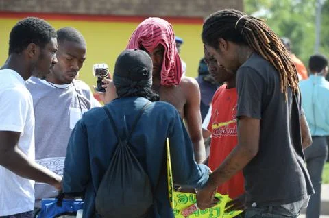 Group of Young Men Praying in Ferguson Stock Photos
