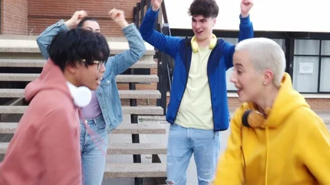 Group of young millennials dancing happily. friends having a good time Stock Footage 205747441