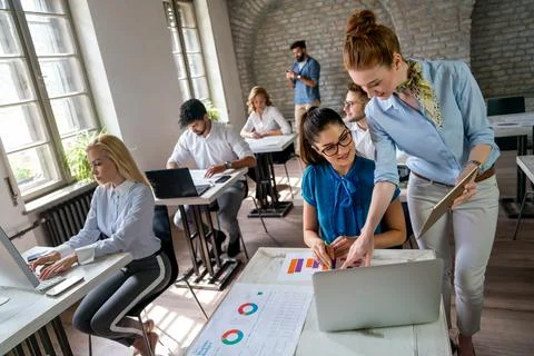 Group of young multi-ethnic startup business team collaborating on project .. Foto stock