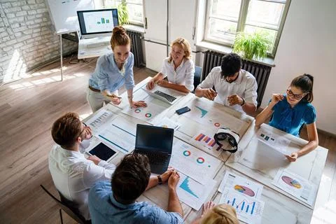 Group of young multi-ethnic startup business team collaborating on project .. Foto stock