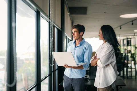 Group of young multi-ethnic startup business team collaborating on project .. Stock Photos