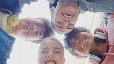 Group of young multiethnic students standing in a circle, having fun Stock Footage 170628498
