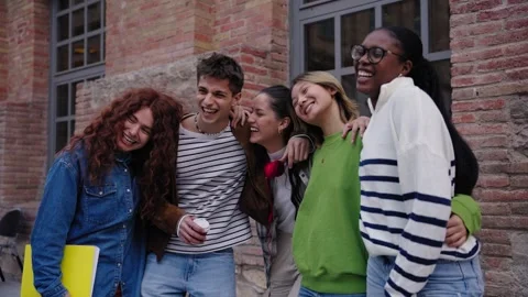 Group young multiracial people students having fun gathered standing together Stock Footage 276629778