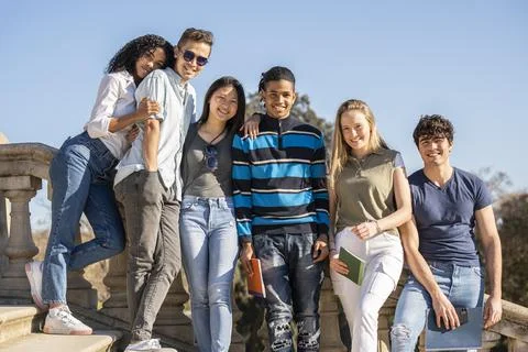 Group of young multiracial students looking to the camera Stock Photos