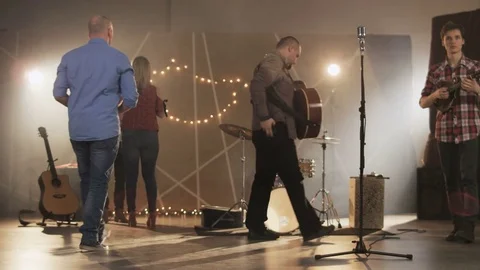 Group of Young Musicians Walking on the Stage Stock Footage 74480783