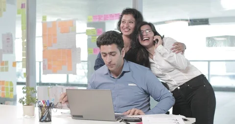 A group of young office workers are overjoyed after completing a difficult task Stock Footage 88629393