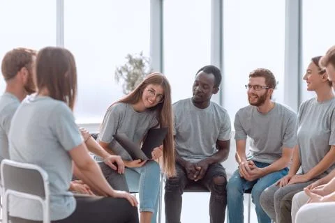 Group of young people applauding the coach after class. Stock Photos