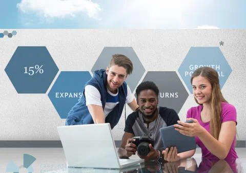 Group of young people on computer with camera in front of business graphics Stock Photos