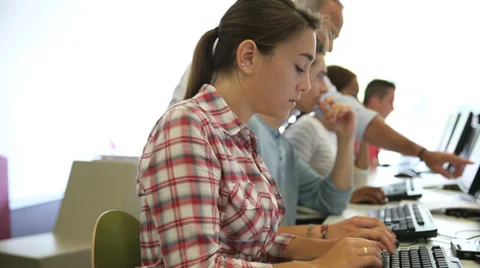 Group of young people in computing class Stock Footage 37633782