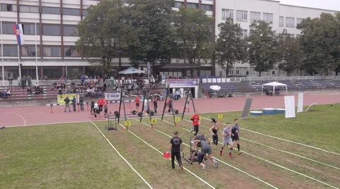 Group of young people doing team workout at the stadium Stock Footage 48941580