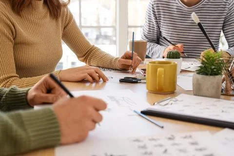 Group of young people during courses of calligraphy Stock Photos