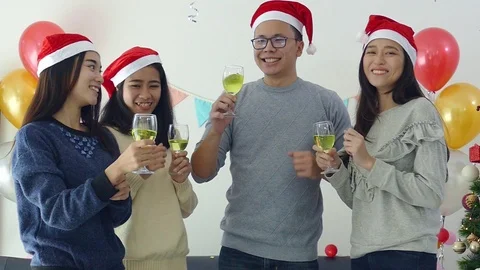 Group of young people having fun in christmas party,Slow motion Stock Footage 99907087
