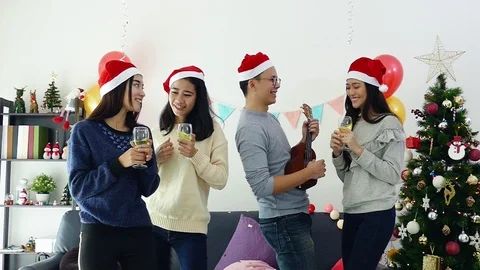 Group of young people having fun in christmas party,Slow motion. Stock Footage 99907246