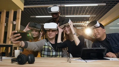 Group of young people having fun with vr virtual reality glasses in the modern Stock Footage 113167067