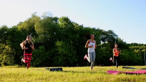 Group of young people having kick boxing training , outdoor Stock Footage
