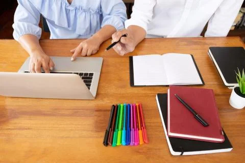 Group of young people learning studying lesson in library during helping teac Stock Photos