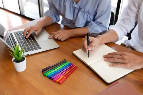 Group of young people learning studying lesson in library during helping teac Stock Photos