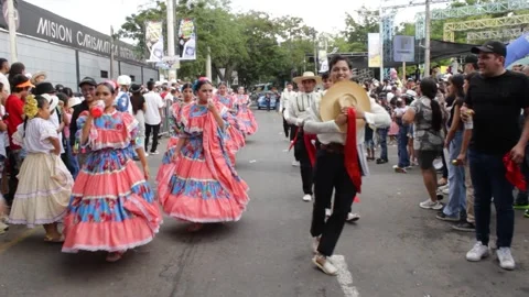 A group of young people practicing choreography at a parade Stock Footage 312410349
